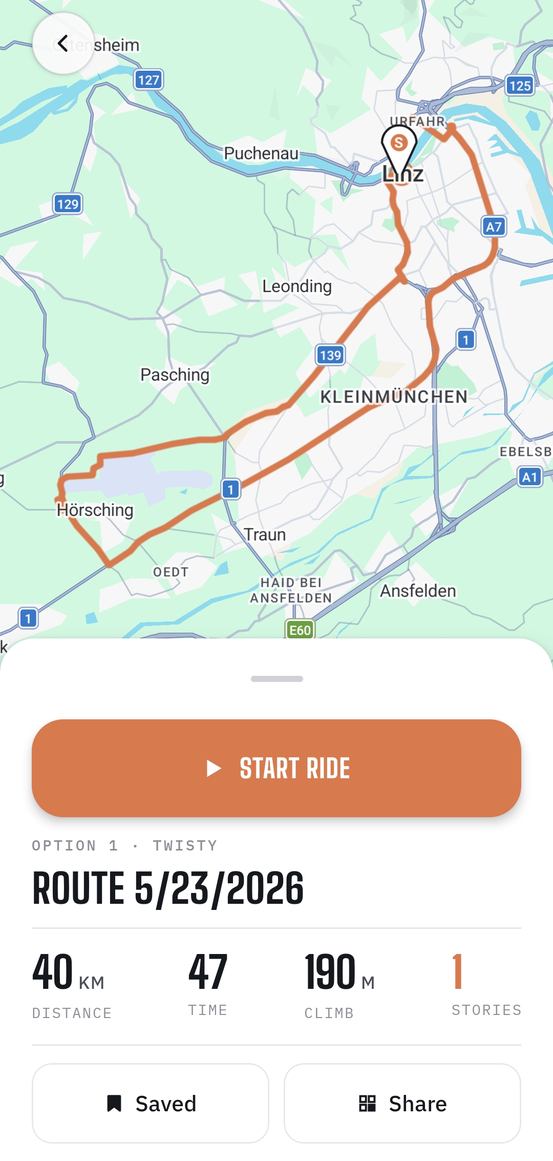 Active-ride HUD showing turn-by-turn directions in dark mode